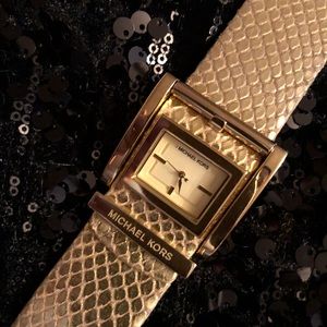 Michael Kors women’s gold snakeskin embossed watch